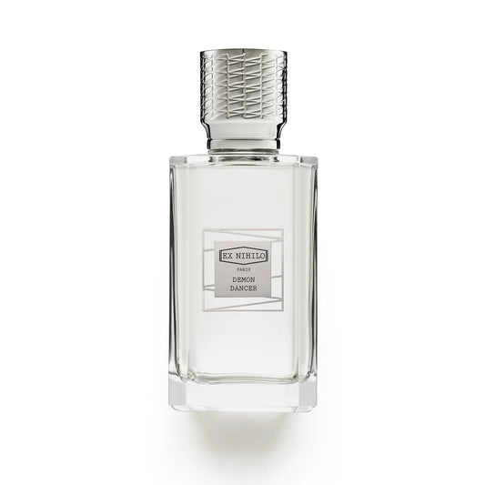A clear glass perfume bottle with a textured silver cap, featuring a silver label that reads 'DE MARLY & CIE DE MARLY' and 'CERISE DANCER'. The bottle is centered on a clean white background with a soft shadow underneath.